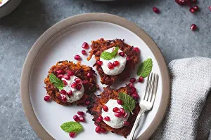 Plate Prints: Harissa sweet potato latkes with spiced yogurt, mint and pomegranate, gluten-free