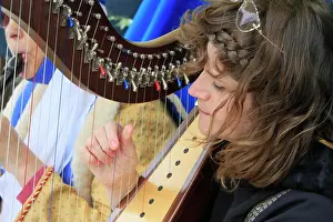 Harp Prints: Harpist in the medieval festival of Provins, Seine-et-Marne, France, Europe