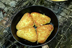 Flames Prints: Hash browns cooking on campfire, Central Otago, South Island, New Zealand
