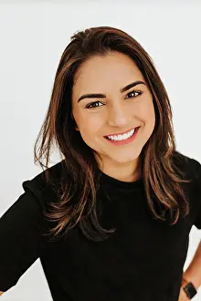 Entrepreneur Prints: Headshot of young professional female smiling at camera