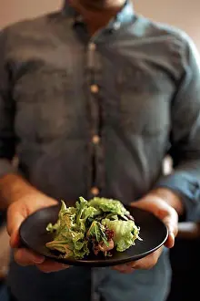 Knife Prints: Healthy Lifestyle. Man Cooking Green Salad Of Romaine Lettuce. Healthy Food concept