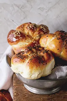 Round Prints: Heap of sweet round sabbath challah bread with white