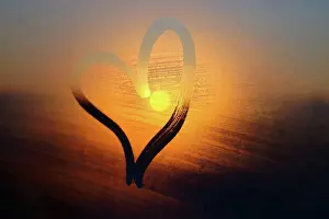 Weather Prints: Heart painted on rainy window at sunset