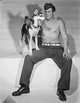 Navy Prints: Hefty Tattooed Shirtless Military Cadet with Dog c.1952