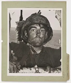 Coast Guard Prints: Back From Hell. Back to a Coast Guard-manned assault transport comes this Marine after two days