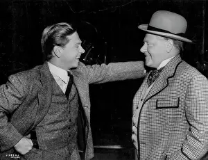 Hollywood Prints: 'Hello, Dad'... Mickey Rooney is visited on a set at Metro-Goldwyn-Mayer