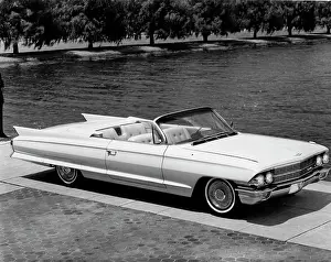 Stationary Prints: High angle view of a convertible car parked near lake, 1962 Cadillac Series 62