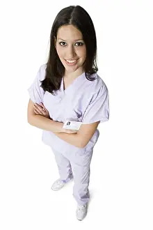 One Young Woman Only Prints: High angle view of a female nurse standing with her arms folded