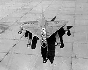 Stationary Prints: High angle view of a fighter plane on a military base
