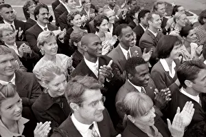 Businesswomen Prints: High angle view of a group of business executives clapping