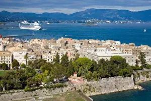 Calm Prints: High angle view of a town with cruise ship in the background