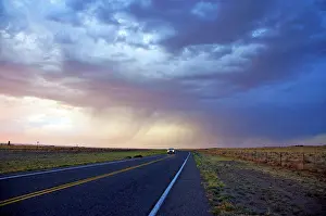 Weather Prints: Highway under the cloudy sky at sunset, New Mexico, USA