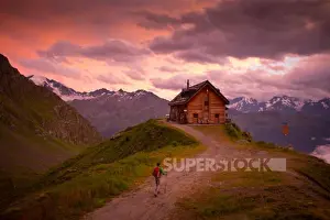 Sun Set Prints: A hiker is almost at the Cabane du Mont Fort