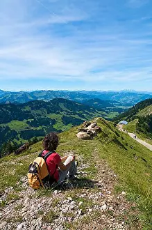 Female Animal Prints: Hiker, Mt. Hochgrat in Oberstaufen, looking west, Allgaeu, Bavaria, Germany, Europe