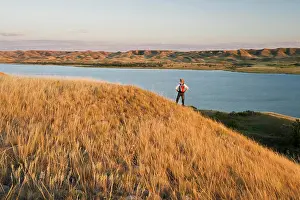 Non Urban Prints: hiker, Saskatchewan Landing Provincial Park with Lake Diefenbaker in the background