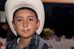 Ceremony Prints: Hispanic boy wearing cowboy hat