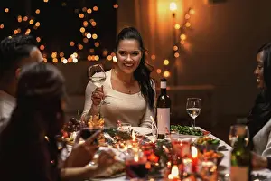 Beverage Prints: holidays, party and celebration concept - multiethnic group of happy friends having christmas dinner at home