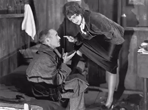 Midadult Men Prints: Hollywood, California: 1934 Actress Pert Kelton lays it down to James Gleason in the RKO film