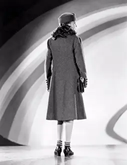 Actress Prints: Hollywood, California: 1935 Actress Helen Parrish models a fashionable winter coat and hat