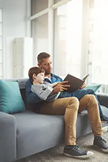 Read Prints: Home, reading book and dad with boy on sofa