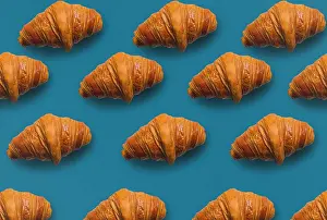 Cafe Prints: Horizontal croissant pattern with blue background