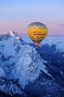 Hot Air Balloon Prints: Hot-air balloon flying above Zugspitze and Waxensteine