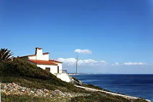 Accommodations Prints: House by the sea