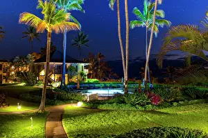 Property Prints: House with swimming pool and palm trees illuminated at night; Kauai