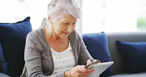 Electronic Prints: House, tablet and old woman with credit card
