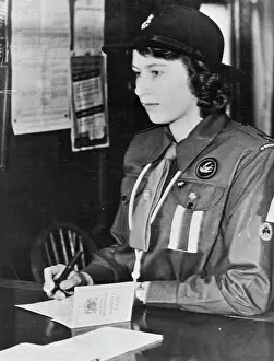 Picture Prints: H.R.H. Princess Elizabeth Registers Princess Elizabeth in Girl Guide uniform registering at a Labour Exchange today