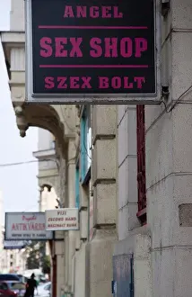 Communications Prints: Hungary Pest County Budapest, Sign for sex shop at the rail terminus Budapest Nyugati palyaudvar