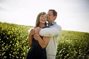 People In Nature Prints: Husband & Wife Laughing in Wildflower Field in San Diego