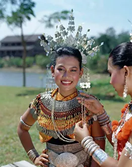 Ceremony Prints: Two Iban women dressed in traditional costumes