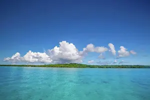 Federated States Of Micronesia Prints: An idyllic tropical view of the shallow lagoon with mid-day clouds over the island of Yap