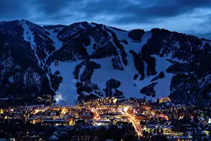 Cold Temperature Prints: Illuminated buildings at Aspen Mountain in winter at night
