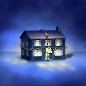 Secure Prints: Illuminated house with chain and padlock