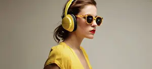 Solid Prints: Image Generated AI. Trendy caucasian woman on yellow headphones
