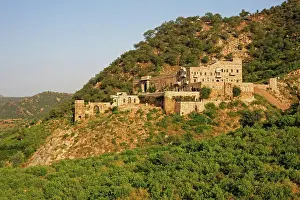 Rajasthan Prints: India, Rajasthan, Alwar. Dadhikar Fort hotel overlooks a charming valley in the Aravalli Hills near Alwar