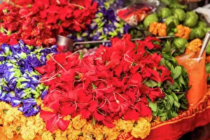 Uttar Pradesh Prints: India, Uttar Pradesh, Varanasi, Ghasi Tola. Flowers strung together to make offerings