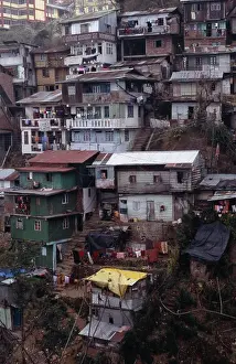 Balcony Prints: INDIA West Bengal Darjeeling. Poor quality housing on steep hillside strewn with litter