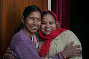 Mother And Daughter Prints: indian mother and daughter hugging each other, India