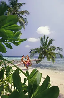 Model Release Prints: Indian Ocean, Maldives, Felidu Atoll. Couple on beach (MR)