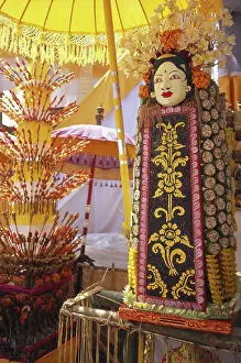 Offer Prints: Indonesia, Bali, Colorful ceremonial mask along with food offerings, ornate