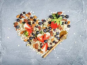 Heart Prints: Ingredients for cooking healthy breakfast muesli in shape of heart