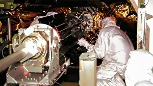 Technician Prints: Installing Power Supply on Cassini Probe