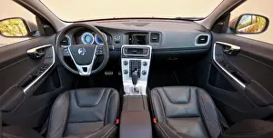Instrument Panel Prints: Interior view of a 2013 Volvo S60 R T6 showing the black leather seats