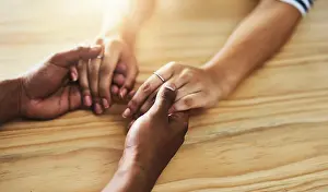 Dating Prints: Interracial couple, holding hands and empathy with support for love