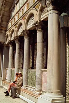 Traveller Prints: Italy, Venice, Couple sitting on ledge of St. Mark's Basilica
