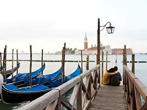 Above 18 Prints: Italy, Venice, Young couple embracing by canal