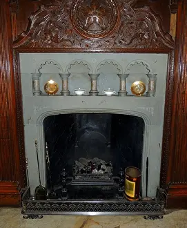 17th Prints: Jacobean 17th century English stone fireplace with wooden facia. Warwick Castle, England
